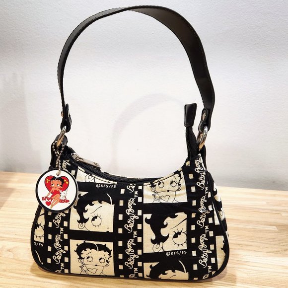 Betty Boop Handbags - BETTY BOOP small purse in great condition with tag